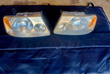 OEM pair of 2004–2008 Ford F-150 (or compatible 2006–2008 Lincoln Mark LT)