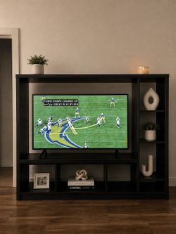 Black TV stand entertainment center