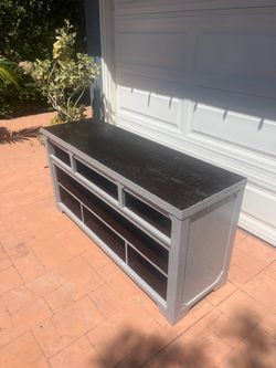 Tv Stand / Entertainment Center by Ashley Furniture