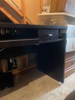 Dark wood composite desk