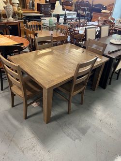 Grey brown wood dining table and chairs (in store)