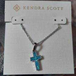Kendra Scott turquoise cross pendant necklace.