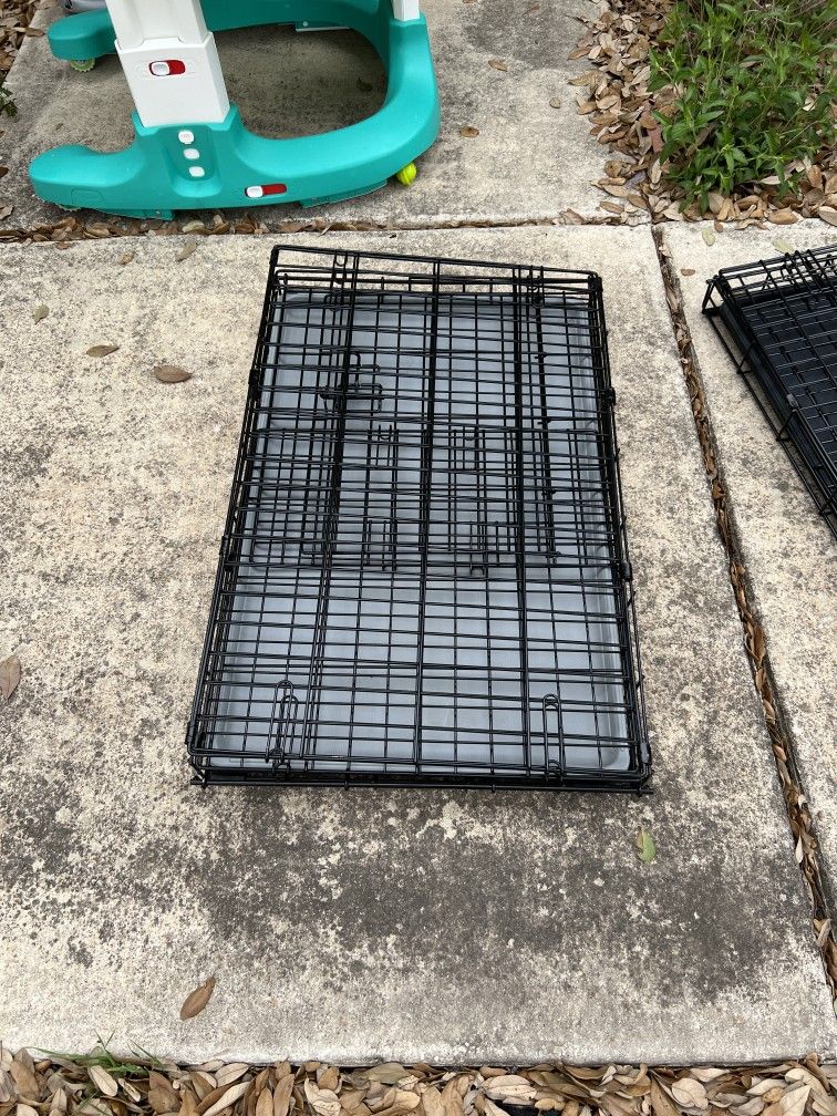 Metal Dog Kennel 

Fold and carry

