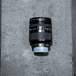 Nikon AF NIKKOR 28-200mm f/3.5-5.6D Camera Lens (includes Hoya UV filter, no rear cap)