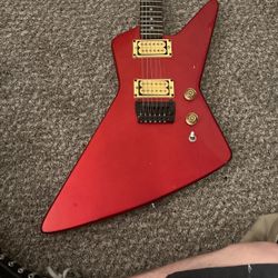 JB player explorer style guitar