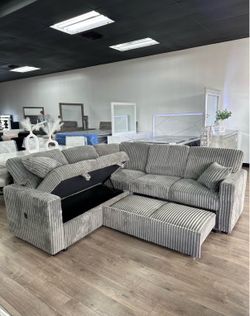 Brand new modern sectional available in grey or brown. Perfect for living rooms, apartments, or guest spaces. • 7.5 ft x 7.5 ft size • Pull-out sleepe