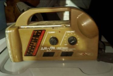 Vintage Portable  A.M./F.M. Radio Combined With A Flashlight Not Tested
