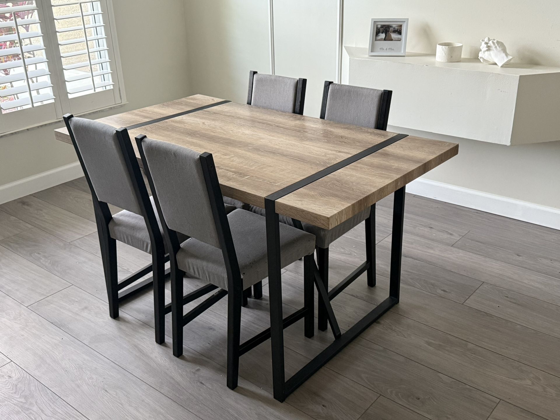 Brown Wood Table With Metal Legs And Chairs