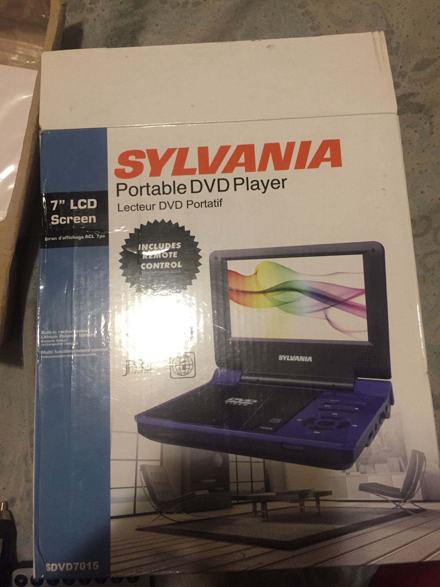 Blue and black sylvania portable DVD player