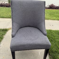 Gray tufted accent chair