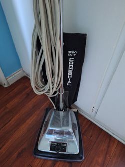 Sanitaire Commercial Vacuum.  Strong