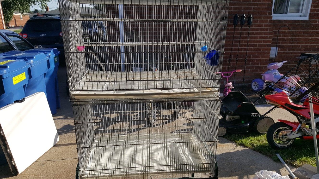 2 bird cages with cart