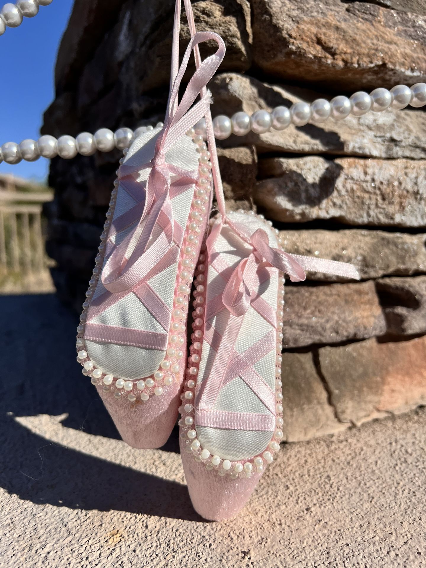 Decorative foam hanging ballet pointe shoes Decorative foam ballet shoes with pearls. Measurements: 6 inches in length and 1 inch to 1.5” in width