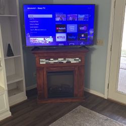 Fireplace (plug In) & 55” TV