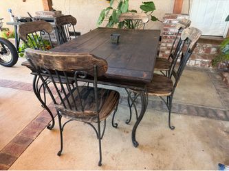 Table. Solid wood with wrought iron legs