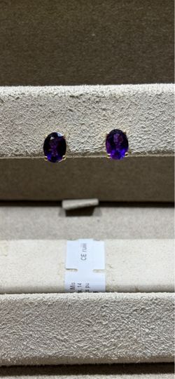 Gold stud earrings