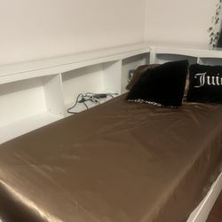 white twin bed with cubbies