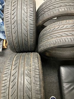 Four BMW, tires wide in the back mid wide in the front two and two