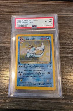 1999 POKEMON JUNGLE #12 VAPOREON-HOLO 1ST EDITION PSA 8