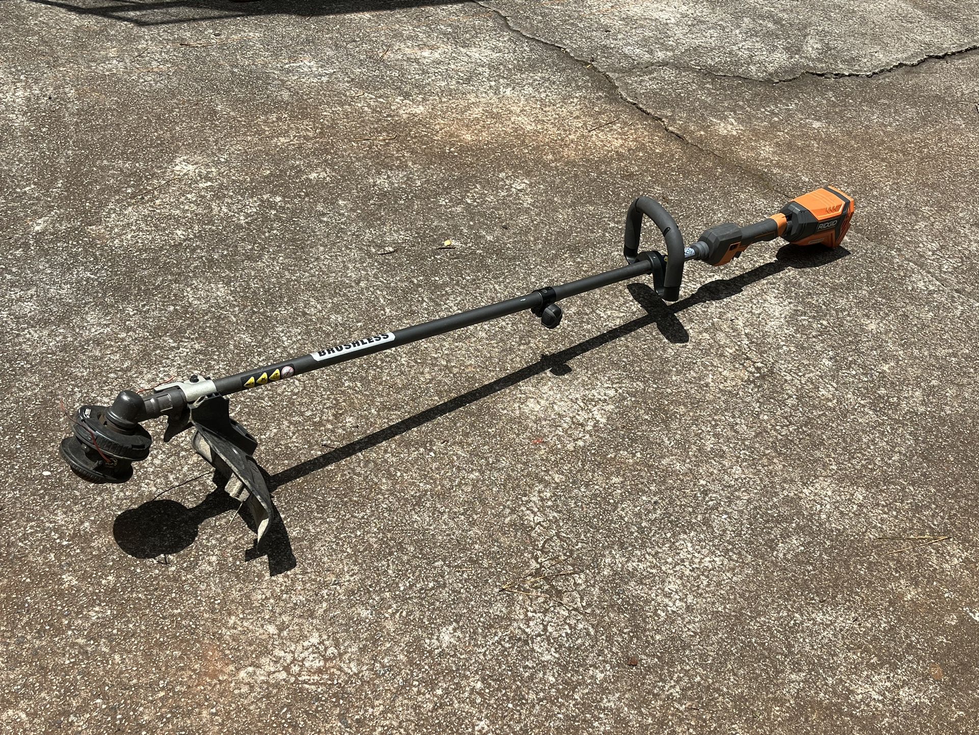 RIDGID 18V Brushless 14 in. Cordless Battery String Trimmer (Tool Only) used