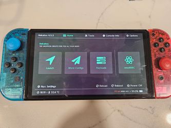 Nintendo Switch Oled with sd card and games