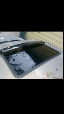 98 to 01 Nissan Altima electric sunroof perfect condition no flaws whatsoever.