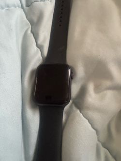 Series 5 Apple Watch black and charger