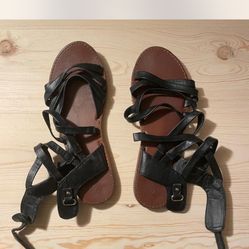 Black Leather Sandals With A Boho Vibe