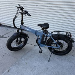 ESKUTE D300 ADVENTURER EBIKE PEAK 1200W-28MPH-RANGE 80MILES. FOLDABLE  BATTERY 48V20.8Ah TIRES 20”x4.0” CAPACITY 360LBS 
