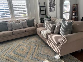 Two pieces of sofas and 10 accents pillows