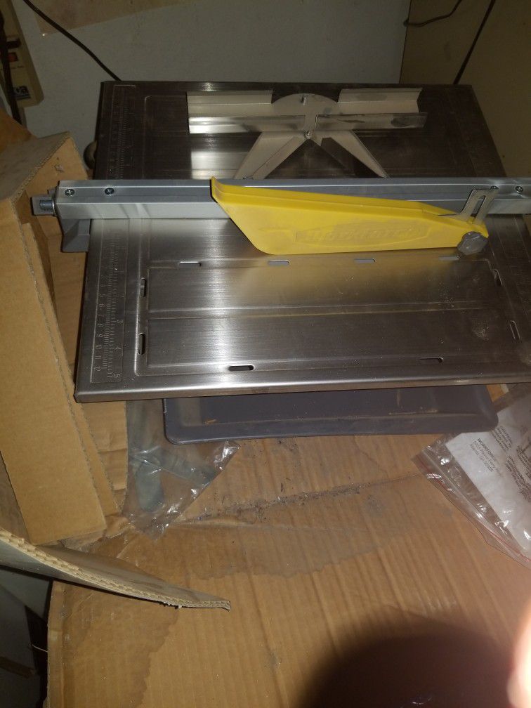 NEW 7 INCH TILE SAW NEVER USED