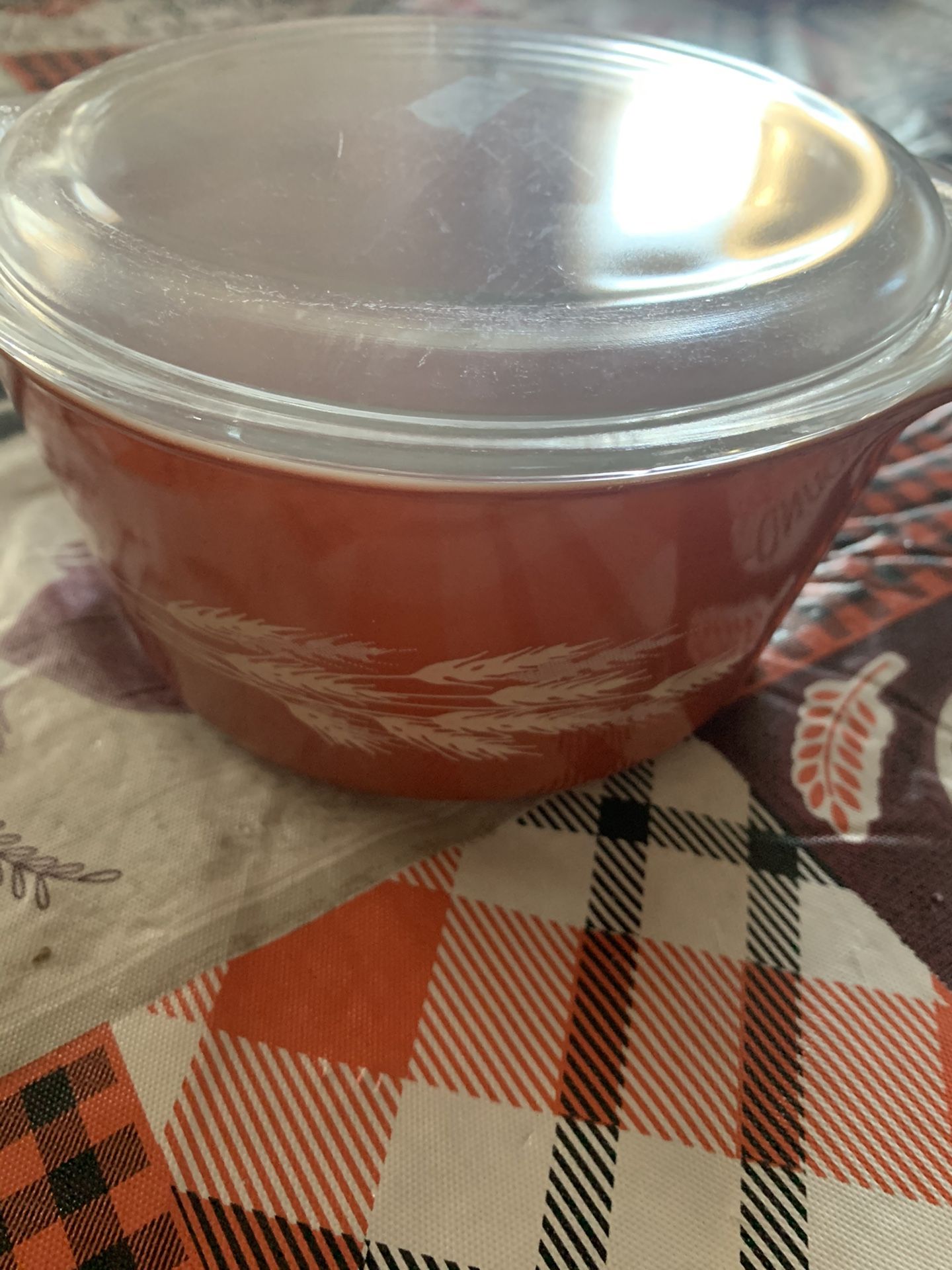 Vintage Pyrex honey wheat bowl with lid.