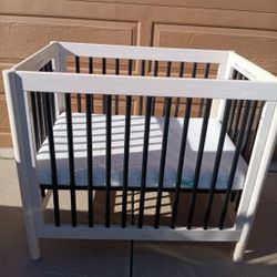 Beautiful Mini Crib with Newton Breathable Baby Mattress