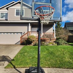 Adjustable basketball hoop