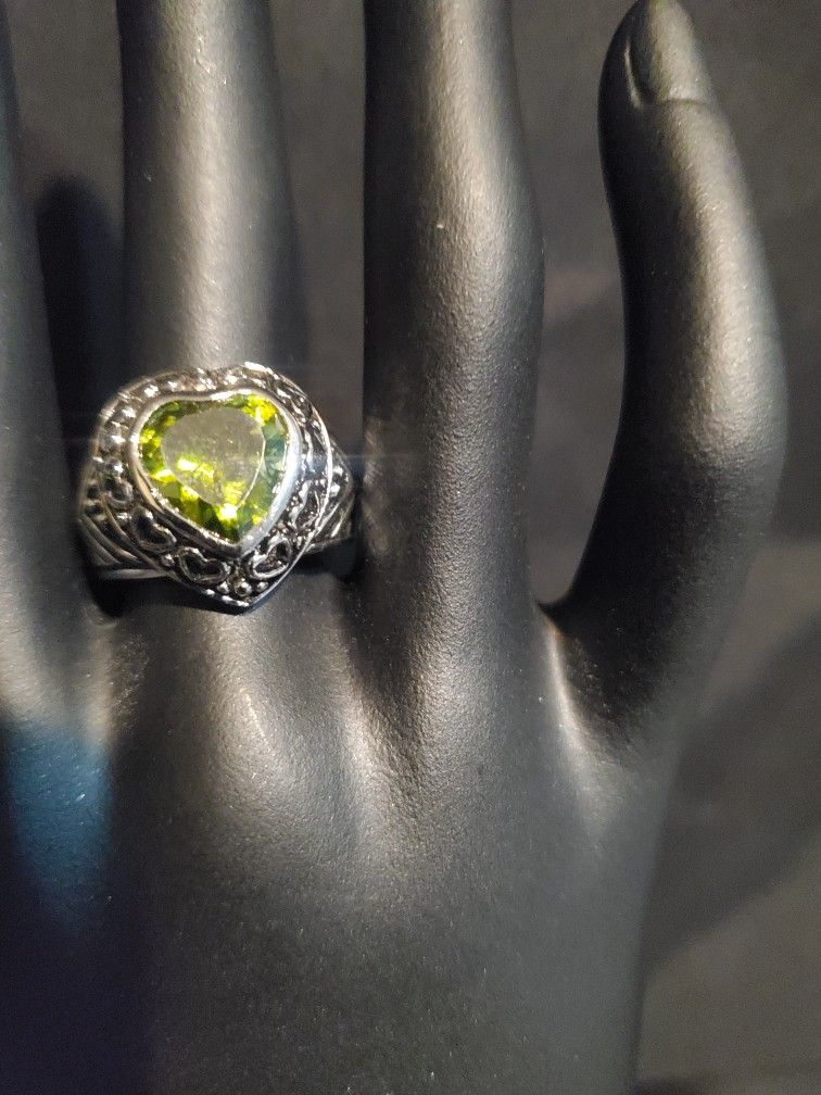silver ring with green stone