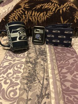Seattle Seahawks coffee mug butane lighter and Dooney and Bourke Trifold leather wallet