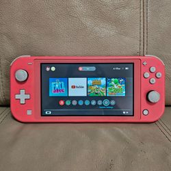 Nintendo Switch Lite 32GB Console – Coral – Good Working Condition – One game plus charger read desc