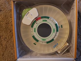 Pill Dispensary With Alarm