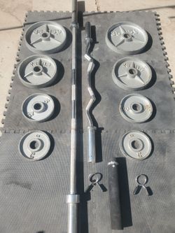 Olympic Weight Set With Olympic Bar & Curl bar  200lbs all together Read Description below