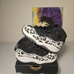 Size 5c - Kids Animal Jordan 11's - $85