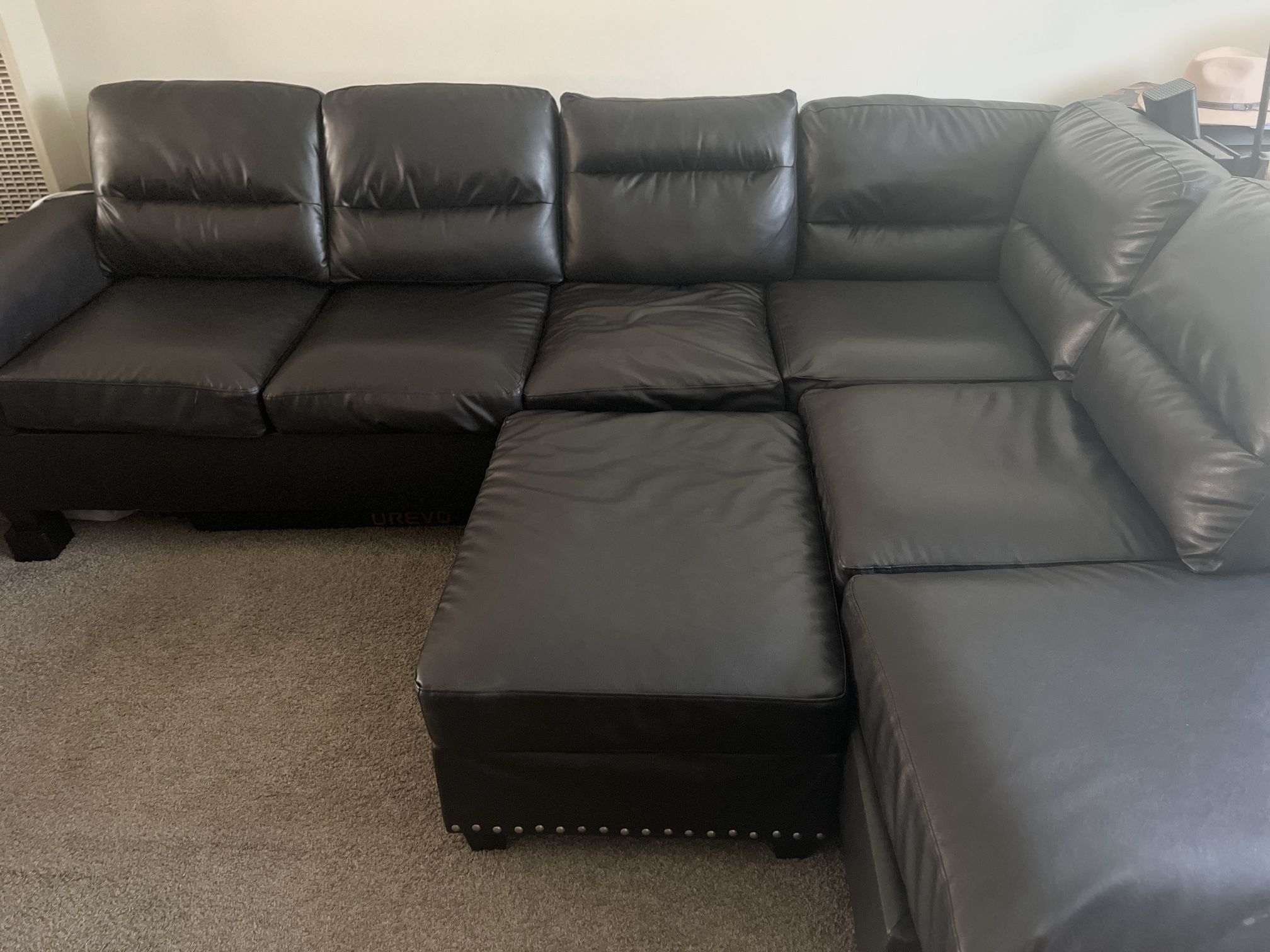 FAUX LEATHER SECTIONAL WITH OTTOMAN