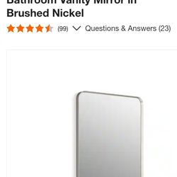 Essential 24 in. W x 36 in. H Rectangular Framed Wall Mount Bathroom Vanity Mirror in Brushed Nickel