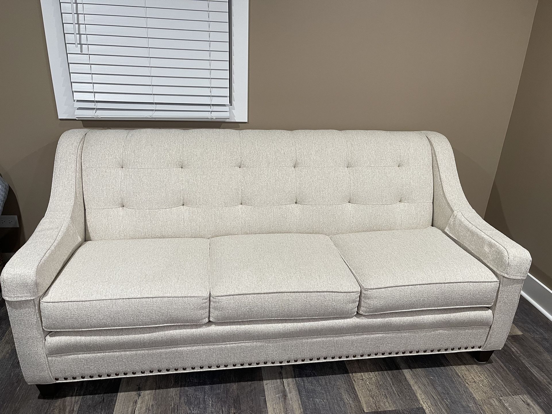 white creamy couch