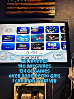 Modded Nintendo Wii over 275 of the best Wii and gamecube games  with 8000+ Games