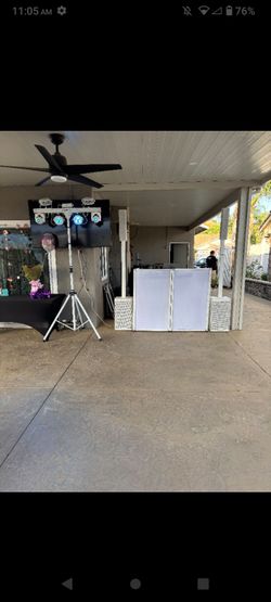DJ Setup with Lights, Booth, and Speakers
