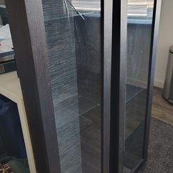 Bertby floating display w/ glass doors from Ikea
