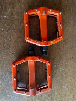Specialized Comp Road drop bars and  Used VP 501 - Orange pedals.  Fixie