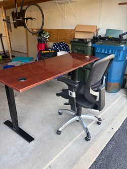 Adjustable electronic standing desk and adjustable chair