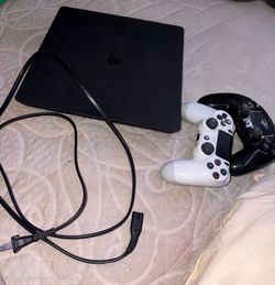 PlayStation 4 Slim Console with Two Controllers