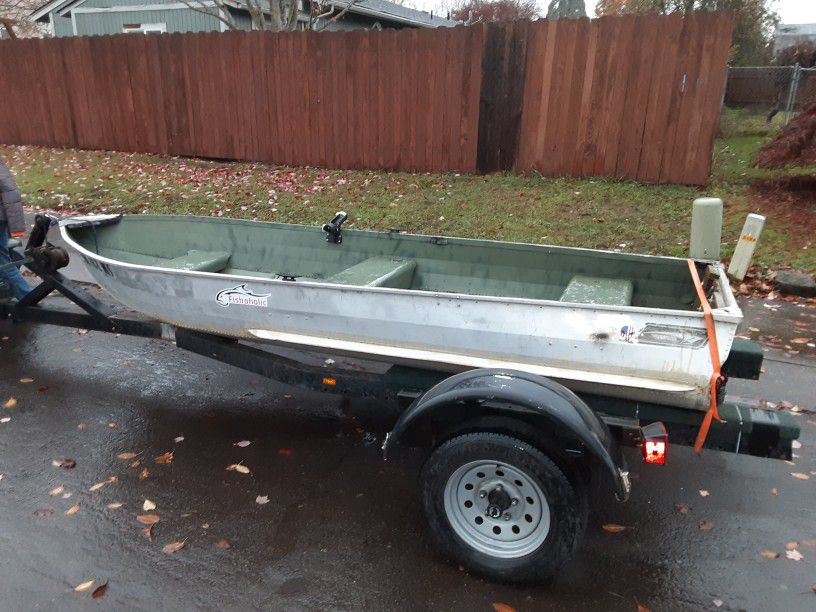 12 Foot Aluminum Boat With Tags, Title, And Trailer.